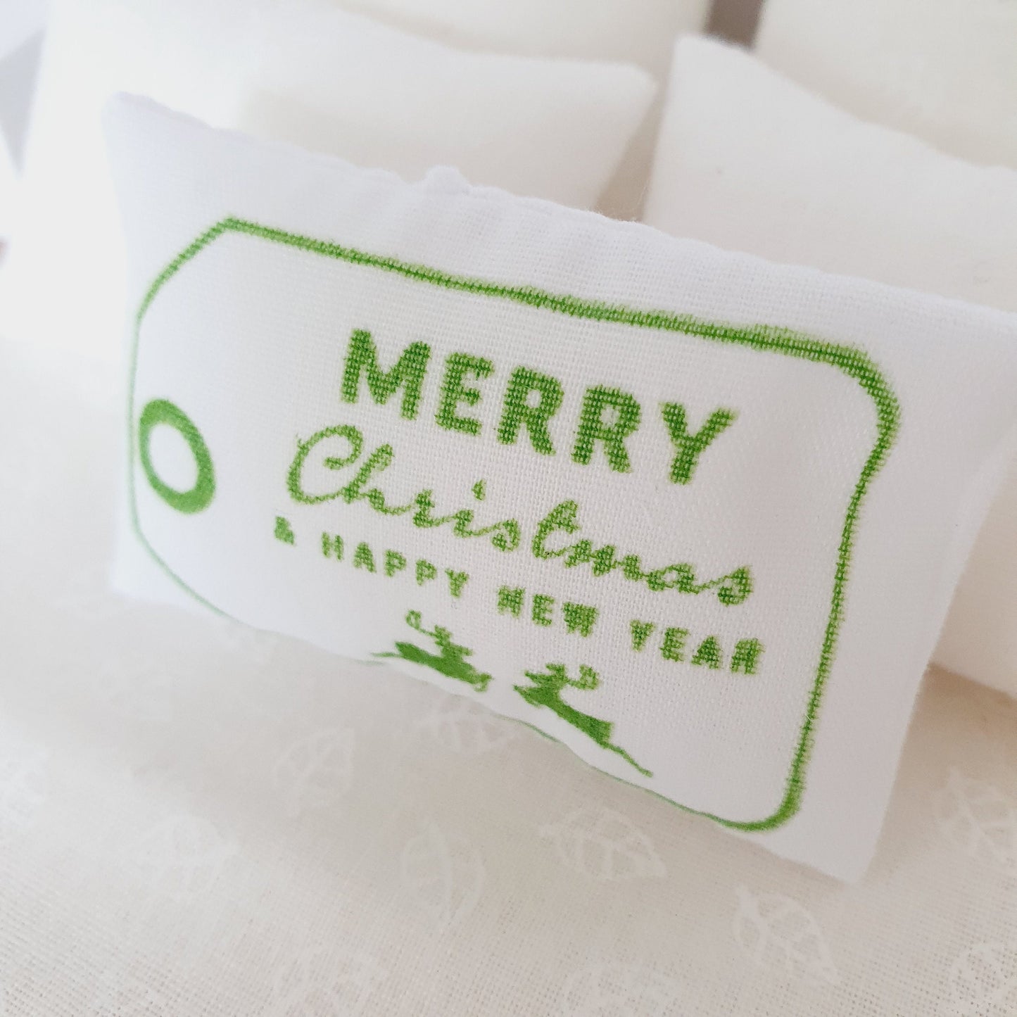 Dolls House Christmas Reindeer Cushion, Green and White, 12th scale cushions, miniature cushion