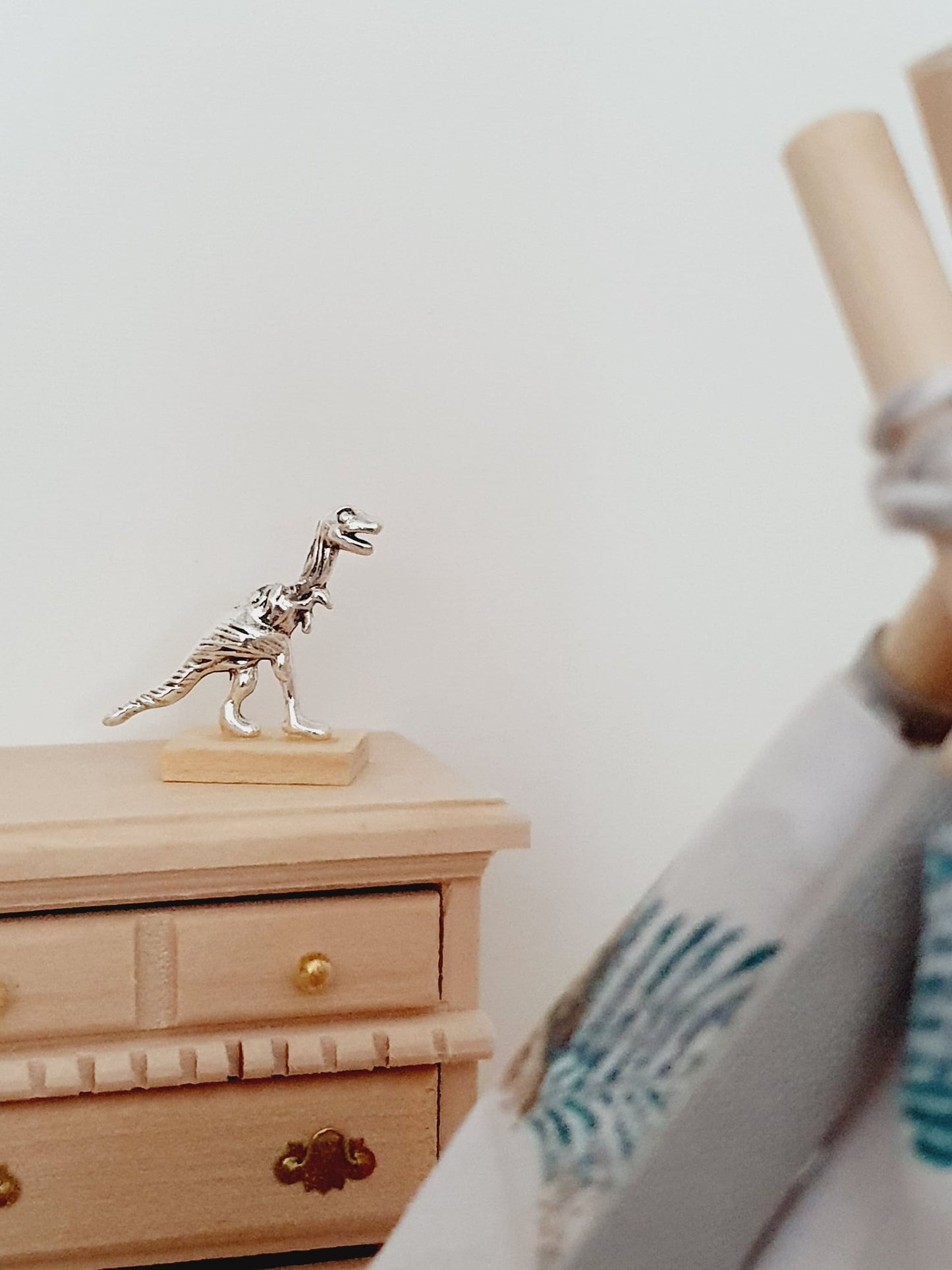 Dolls House Small Dinosaur Ornament on a wooden stand, 1:12th Scale, Miniature dino on a stand