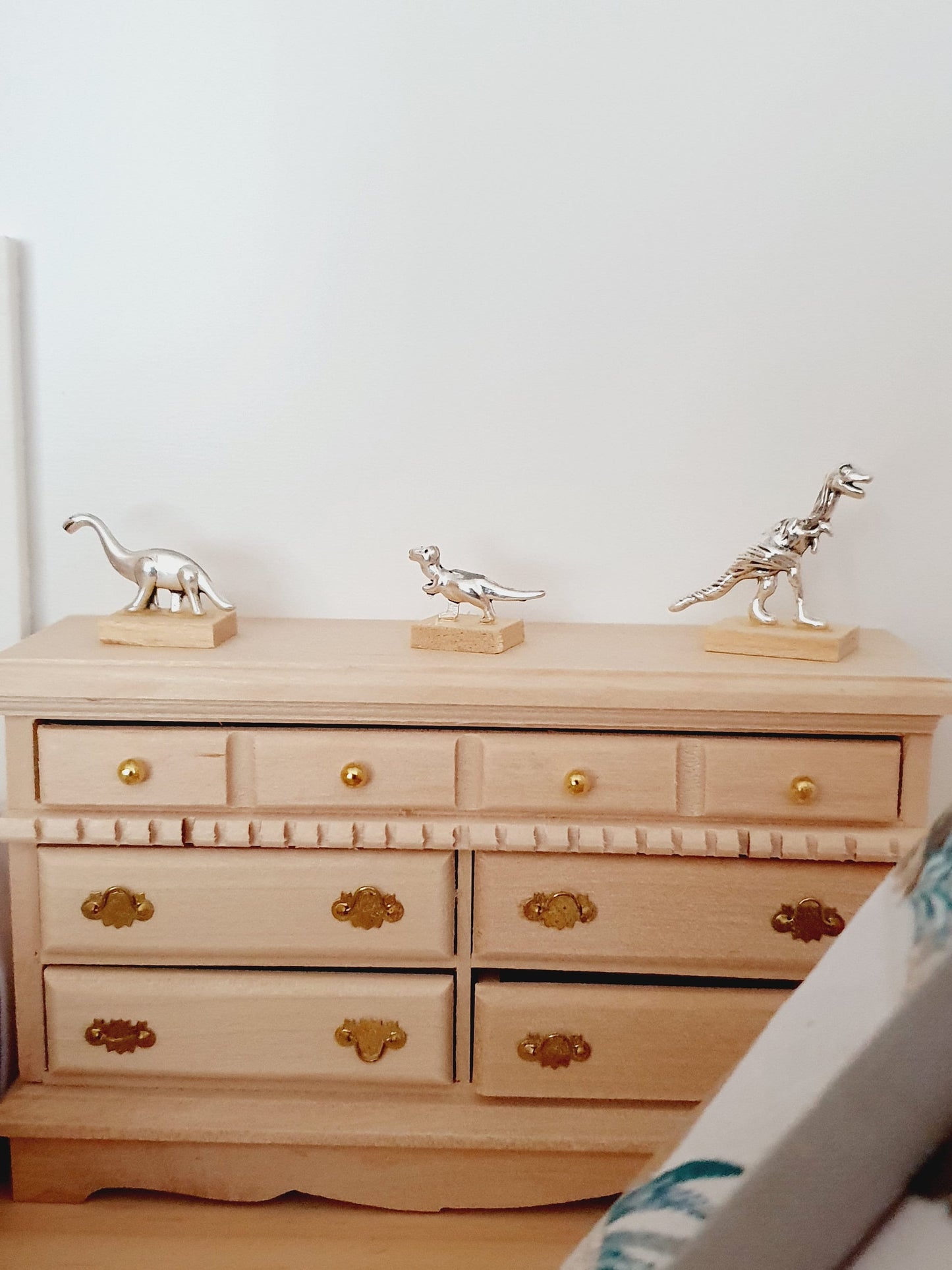 Dolls House Small Dinosaur Ornament on a wooden stand, 1:12th Scale, Miniature dino on a stand