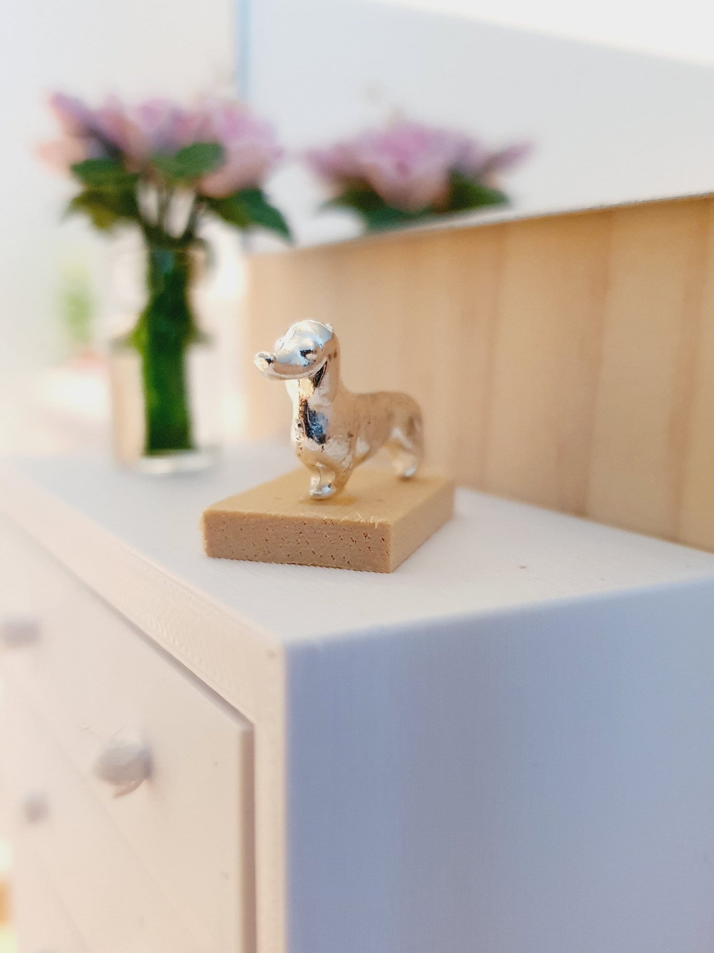 Dolls House Small Sausage Dog Ornament on a wooden stand, 1:12th Scale, Miniature dog on a stand