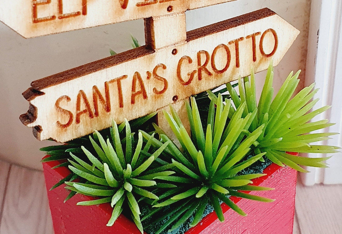 Dolls House Wooden Christmas Sign in Coloured Plant Pot with Green Plants, 1:12th Scale, Miniature Plant Pot, Dollhouse Christmas