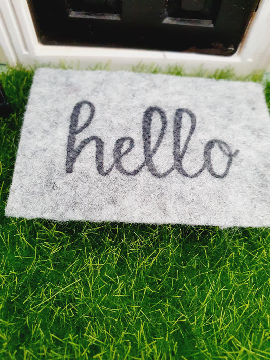 Hello Grey Fabric Doormat – alternate view 2 | 1:12 scale dolls house miniature