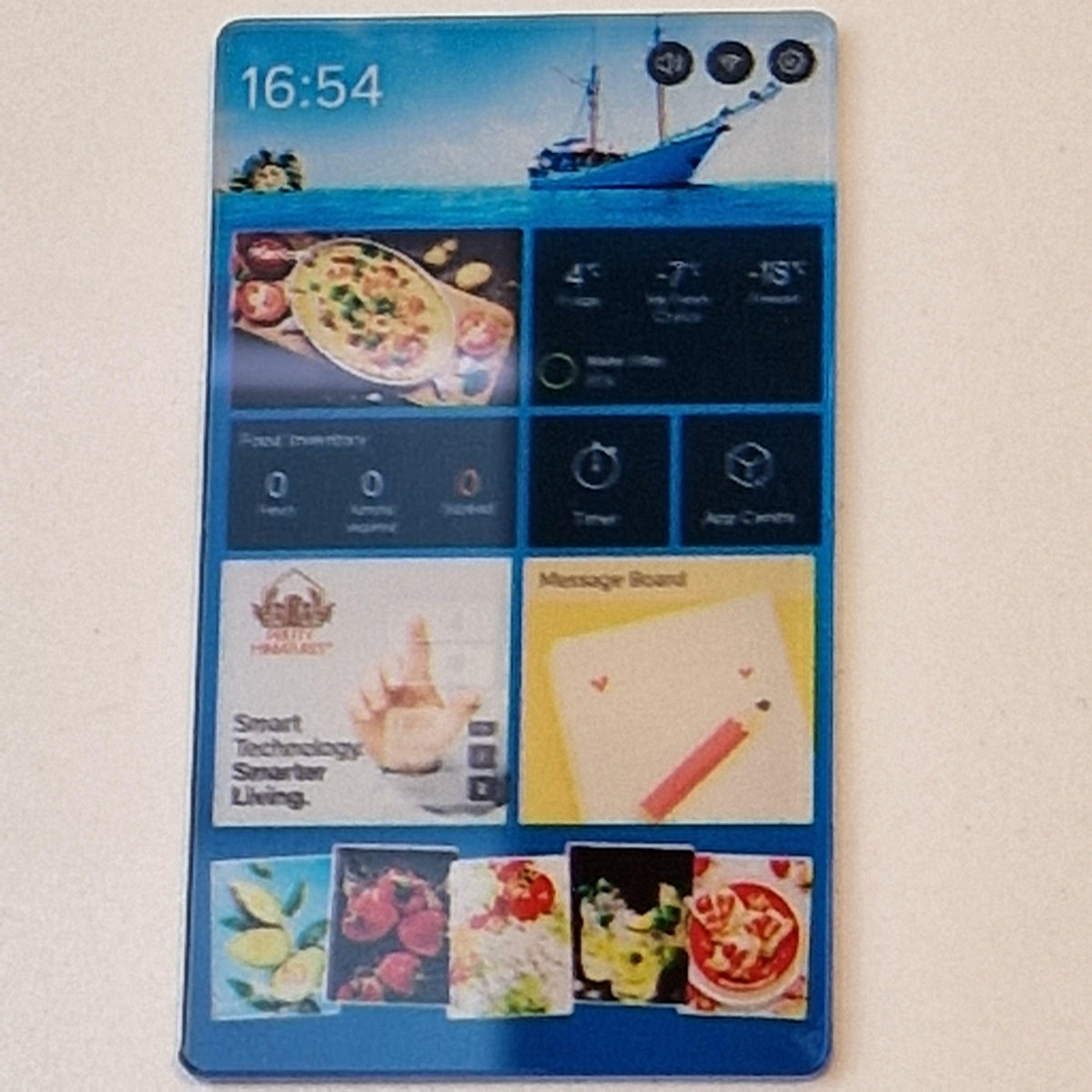 Blue decorative screen design included with the miniature fridge freezer