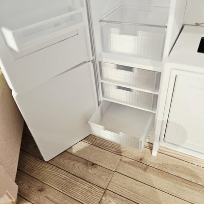 Three freezer drawers inside the open lower section of the 1:12 scale fridge freezer