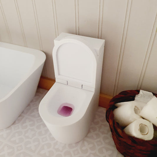 dolls house white toilet, pretend pushbutton on top of toilet, lid opens up, pink resin inside, toilet cleaner, 3d printed, H: 6.5cm D: 5cm W: 3cm, 12th scale miniature