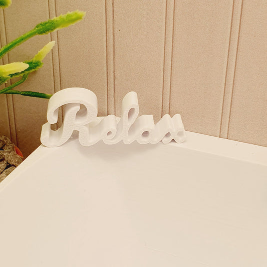 dollhouse bath sign, word relax, white, H: 1.4 cm W: 3.8cm D: 0.7 cm,3d printed, 12thscale miniature