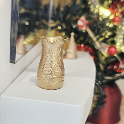 Gold flared christmas scene vase in a 1:12 scale dolls house display, detail view