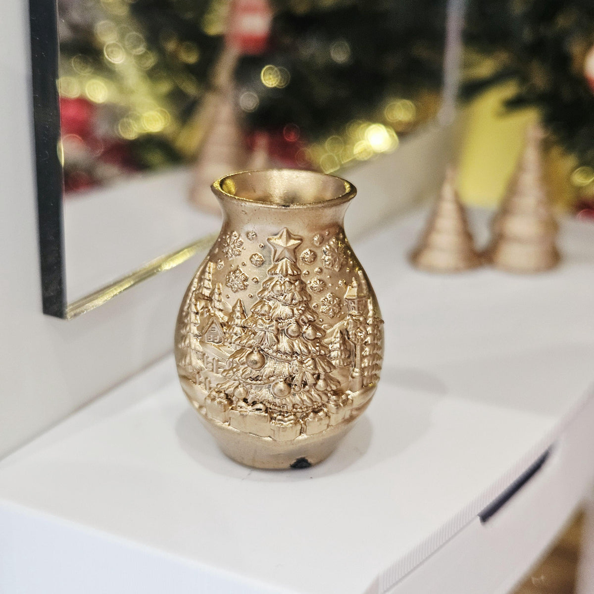 Gold christmas tree vase in a 1:12 scale dolls house display