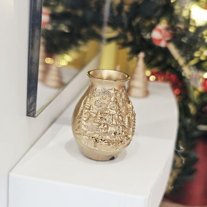 Gold christmas tree vase in a 1:12 scale dolls house display, detail view