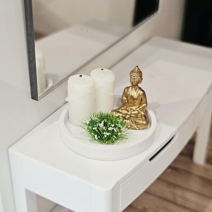 Gold Buddha ornament with two white candles and a white-flowering plant on a white tray, 1:12 scale dolls house