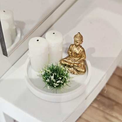 Gold Buddha ornament with two white candles and a white-flowering plant on a white tray, 1:12 scale dolls house