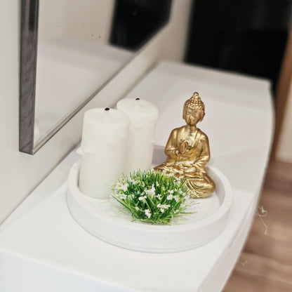 Gold Buddha ornament with two white candles and a white-flowering plant on a white tray, 1:12 scale dolls house