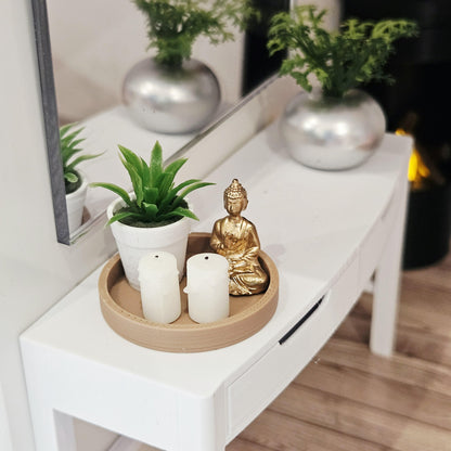 Gold Buddha, two white candles and a green plant in a white pot on a wood effect tray, 1:12 scale dolls house