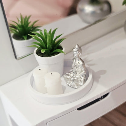 Silver Buddha, two white candles and a green plant in a white pot on a white tray, 1:12 scale dolls house