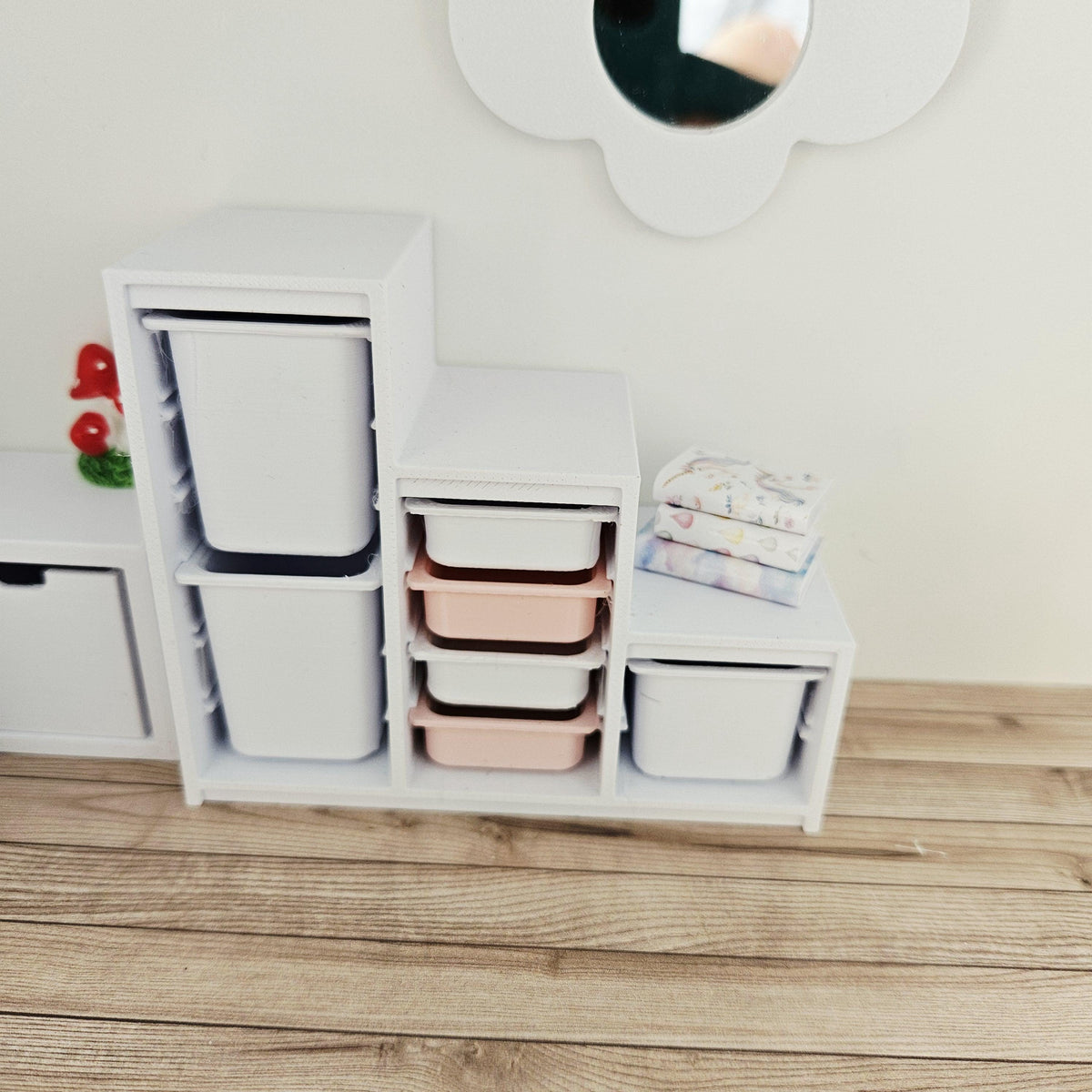 Pink & White storage unit with seven trays & bins in a 1:12 scale dolls house display, detail view