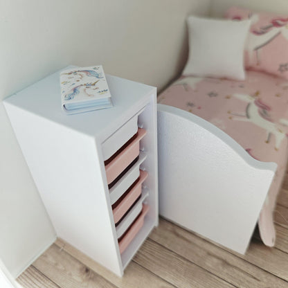 Pink & White storage unit with six boxes in a 1:12 scale dolls house display, detail view
