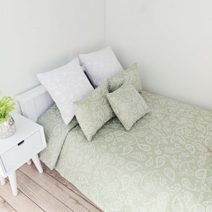 green paisley double bedding set in a 1:12 scale dolls house display, detail view 6