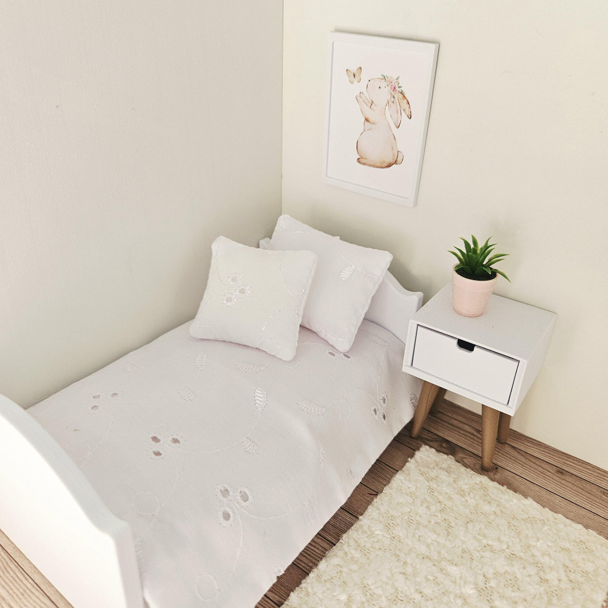 white floral leaf junior bedding set in a 1:12 scale dolls house display, detail view 5