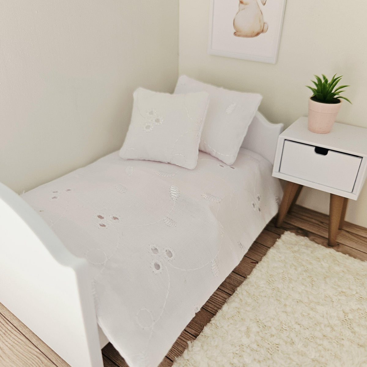 white floral leaf junior bedding set in a 1:12 scale dolls house display, detail view 6