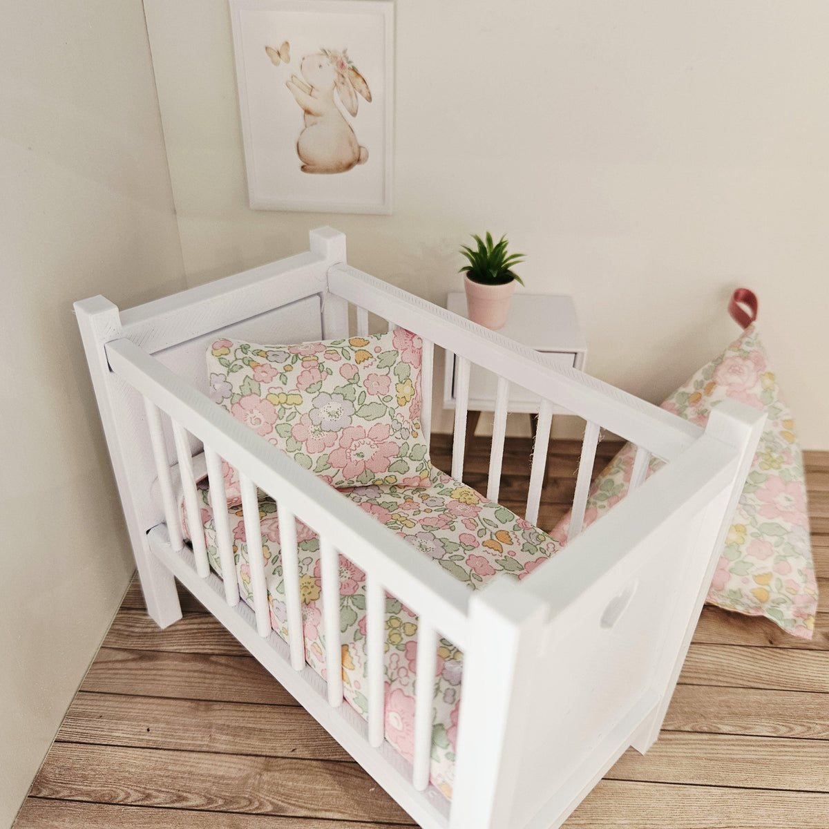 pastel liberty floral cot bedding set in a 1:12 scale dolls house display, detail view 5