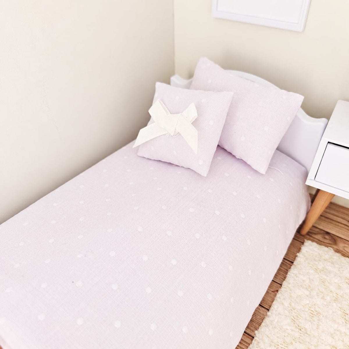 white polka dot junior bedding set in a 1:12 scale dolls house display, detail view 2