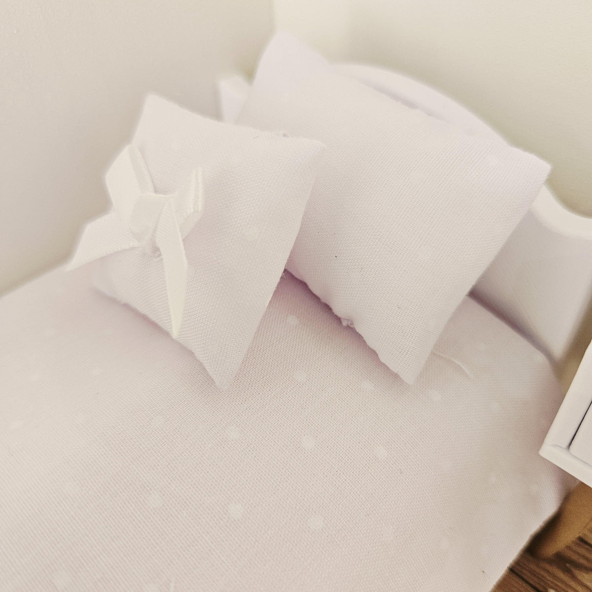 white polka dot junior bedding set in a 1:12 scale dolls house display, detail view 5