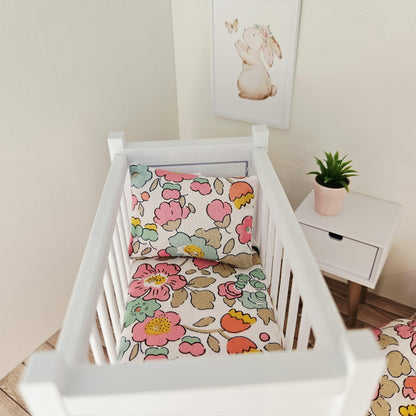 pink & yellow liberty floral cot bedding set in a 1:12 scale dolls house display, detail view 2