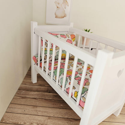 pink & yellow liberty floral cot bedding set in a 1:12 scale dolls house display, detail view 3