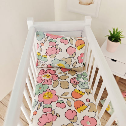 pink & yellow liberty floral cot bedding set in a 1:12 scale dolls house display, detail view 4