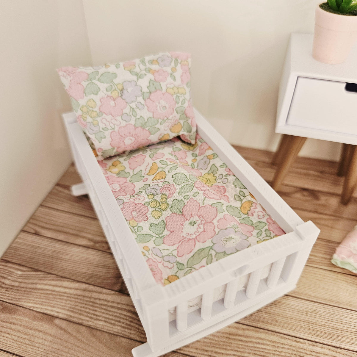 pastel liberty floral crib bedding set in a 1:12 scale dolls house display