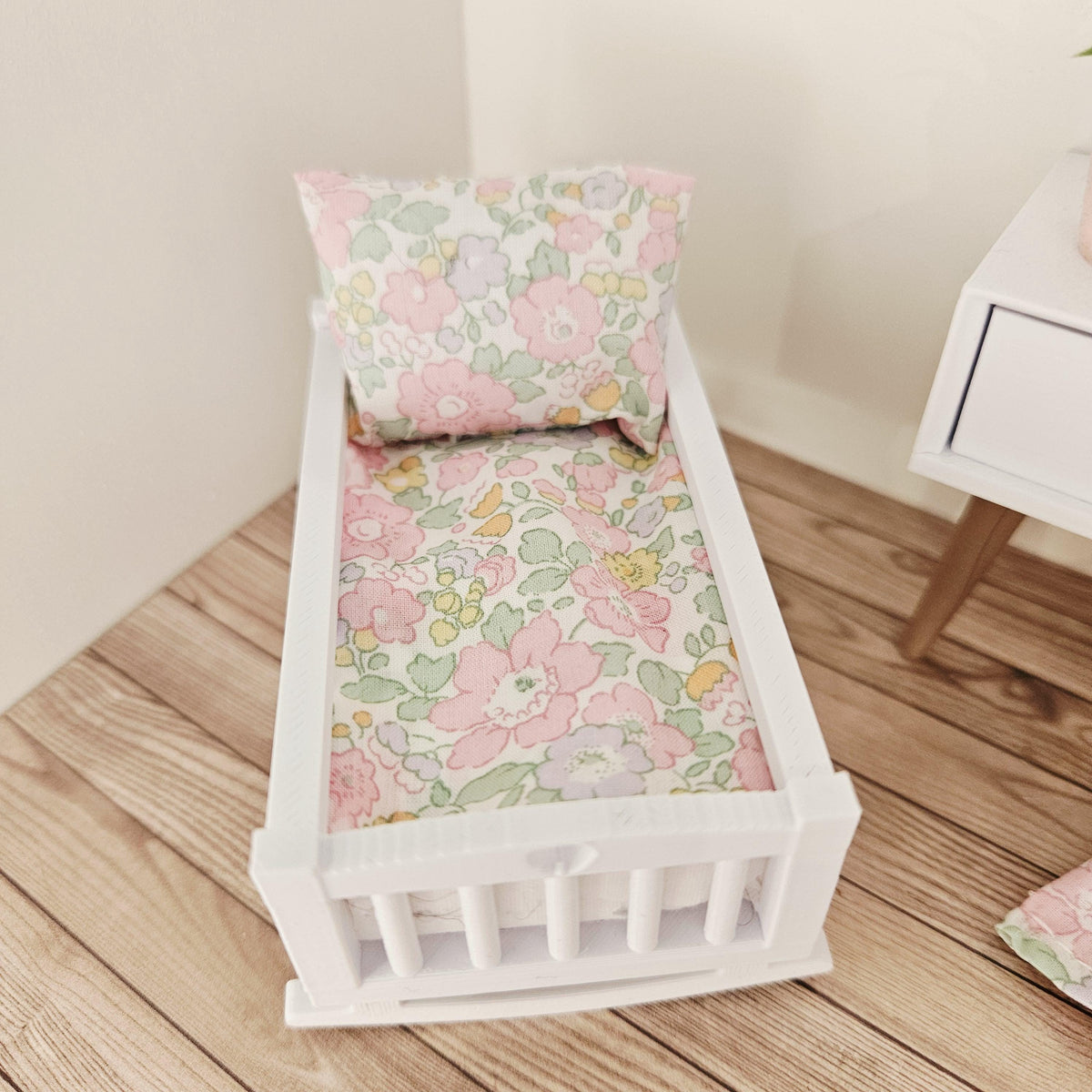 pastel liberty floral crib bedding set in a 1:12 scale dolls house display, detail view 2