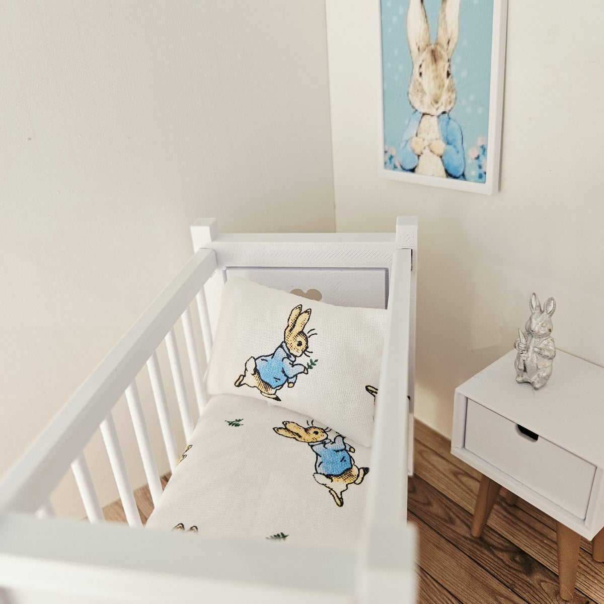 peter rabbit cot bedding set in a 1:12 scale dolls house display, detail view 2