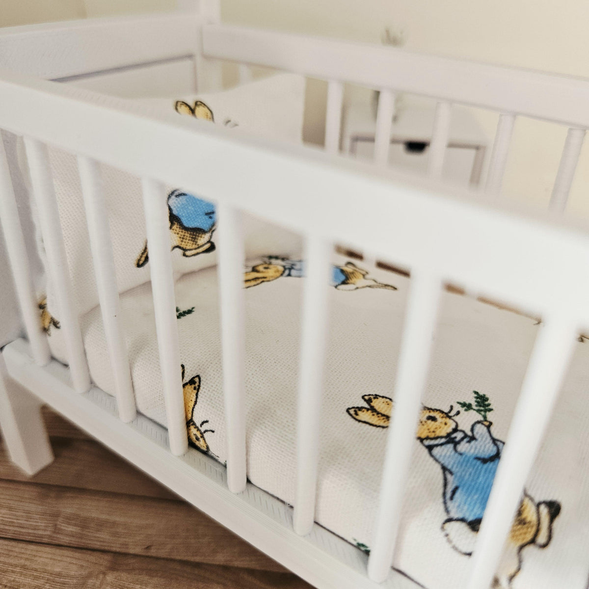 peter rabbit cot bedding set in a 1:12 scale dolls house display, detail view 5