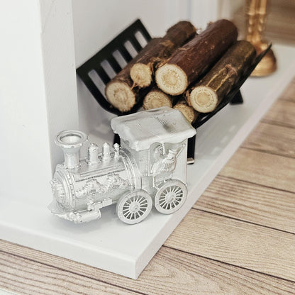 Silver christmas santa train ornament in a 1:12 scale dolls house display, detail view 4