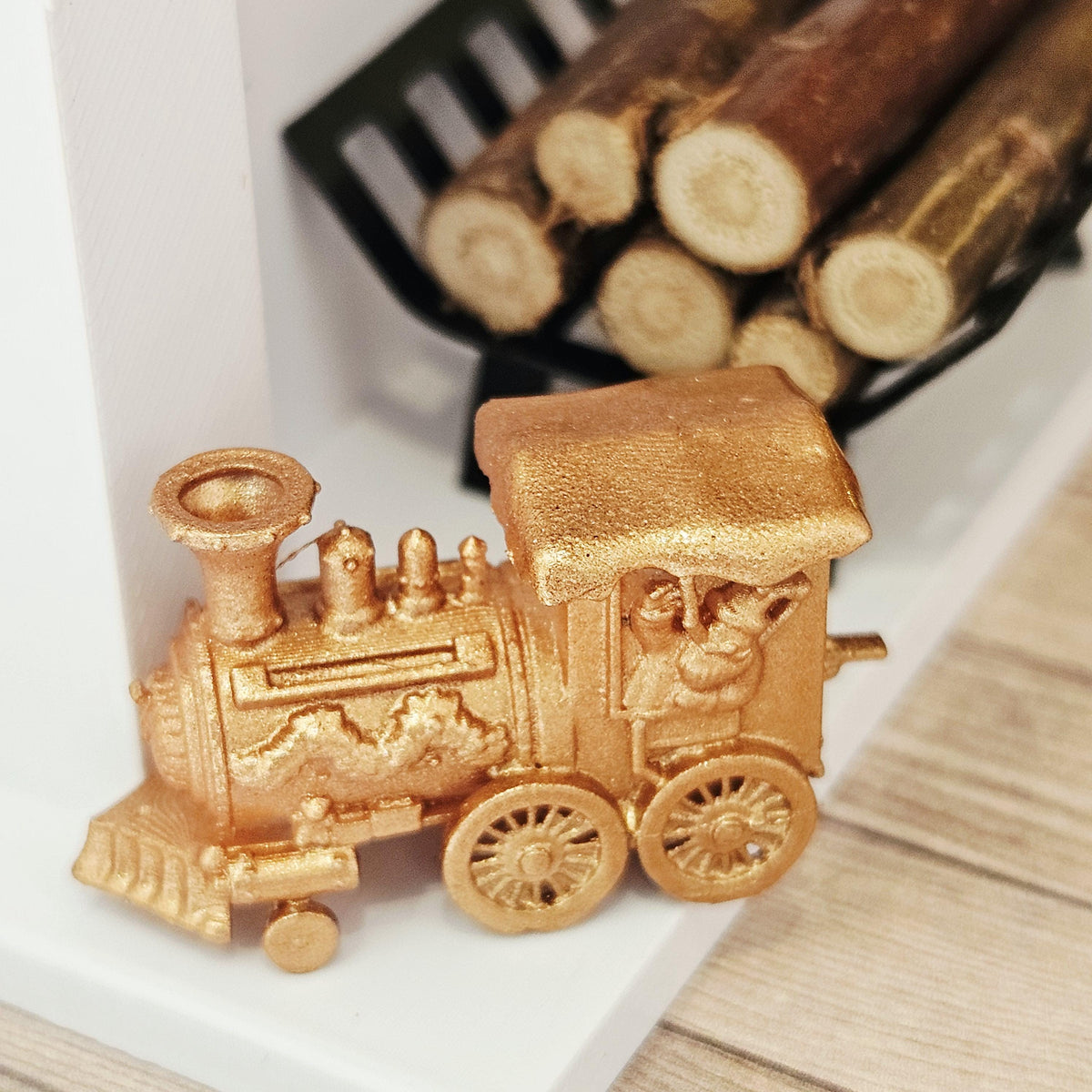 Copper christmas santa train ornament in a 1:12 scale dolls house display, detail view 5