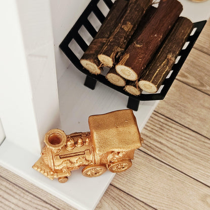 Copper christmas santa train ornament in a 1:12 scale dolls house display, detail view 8