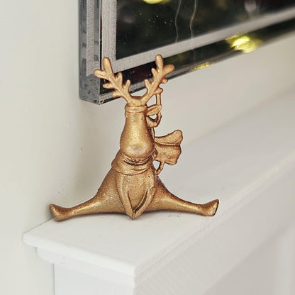 Warm metallic seated christmas reindeer ornament in a 1:12 scale dolls house display, detail view 4