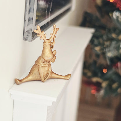 Warm metallic seated christmas reindeer ornament in a 1:12 scale dolls house display, detail view 5