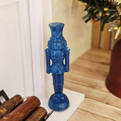 Blue christmas nutcracker ornament in a 1:12 scale dolls house display, detail view 10