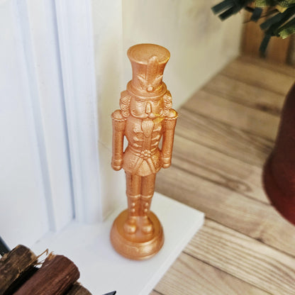 Copper christmas nutcracker ornament in a 1:12 scale dolls house display, detail view 9