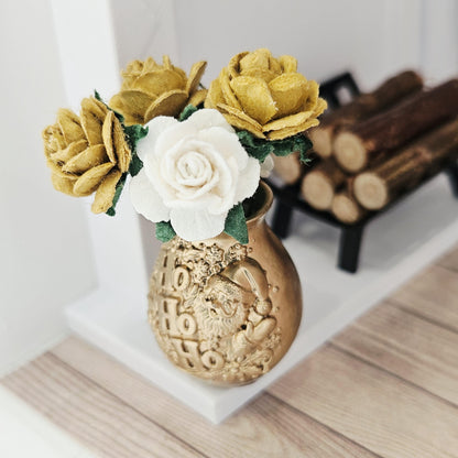 Gold santa vase with gold & white roses in a 1:12 scale dolls house display, detail view 2