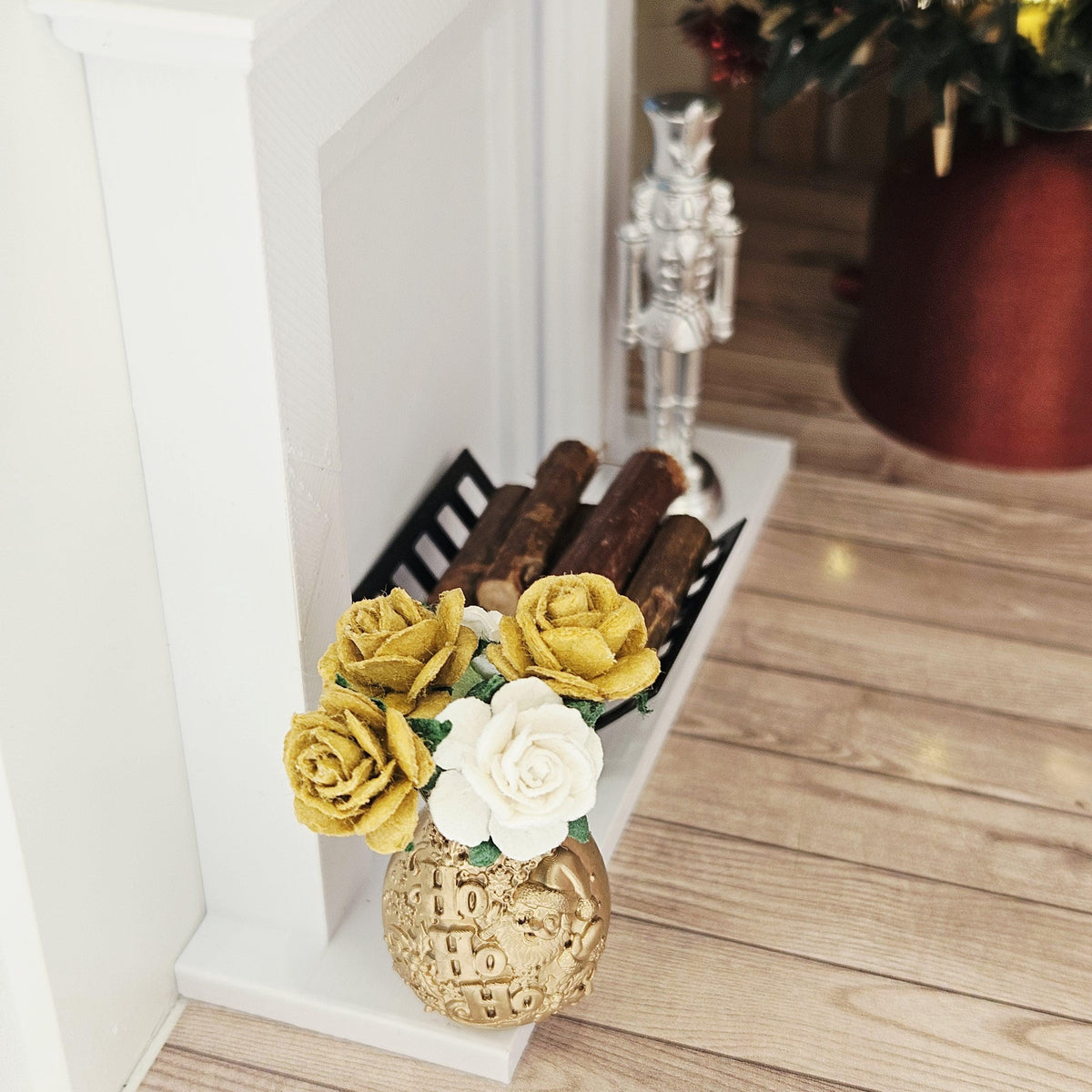 Gold santa vase with gold & white roses in a 1:12 scale dolls house display, detail view 4