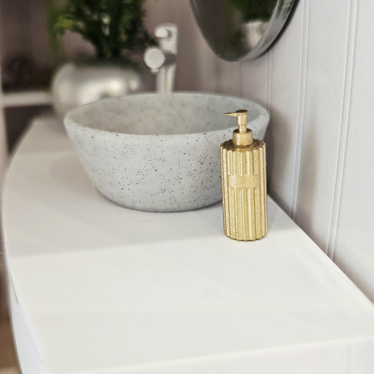 Gold ribbed soap pump in a 1:12 scale dolls house display