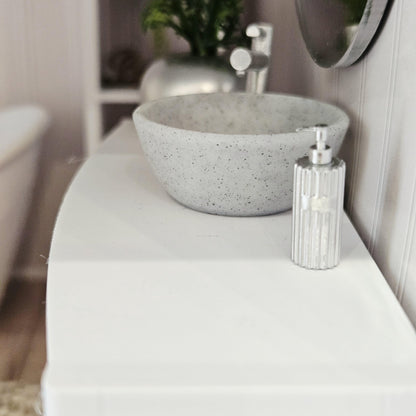 Silver ribbed soap pump in a 1:12 scale dolls house display, detail view 3