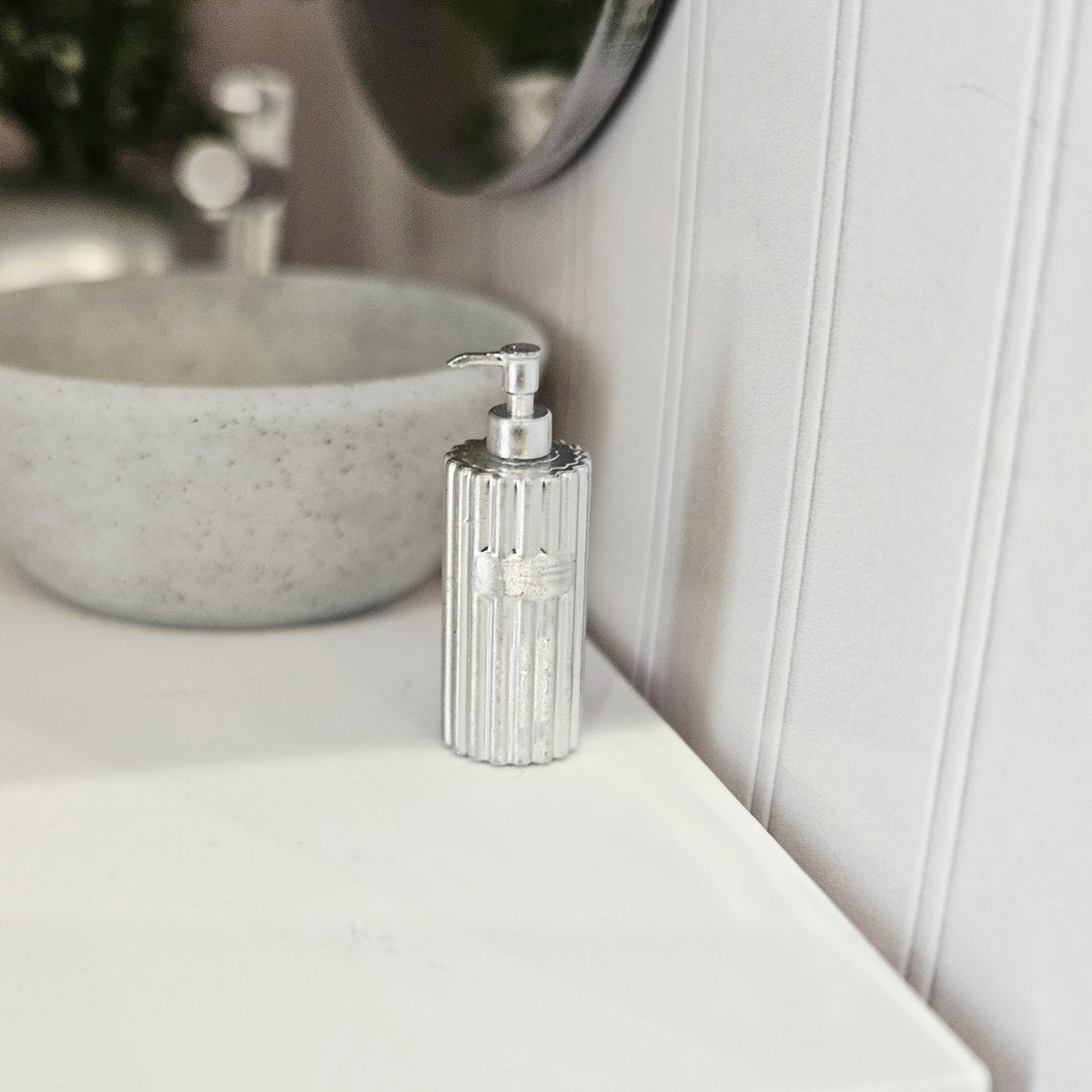 Silver ribbed soap pump in a 1:12 scale dolls house display, detail view 4