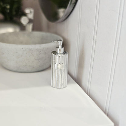 Silver ribbed soap pump in a 1:12 scale dolls house display, detail view 4
