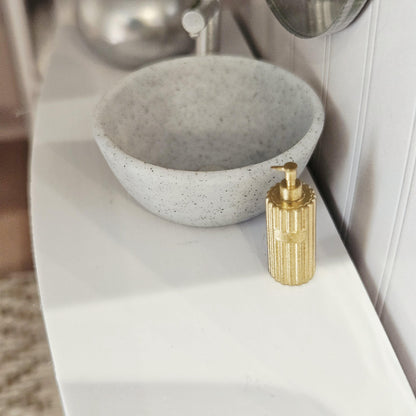Gold ribbed soap pump in a 1:12 scale dolls house display, detail view 5