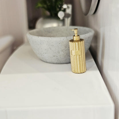Gold ribbed soap pump in a 1:12 scale dolls house display, detail view 6