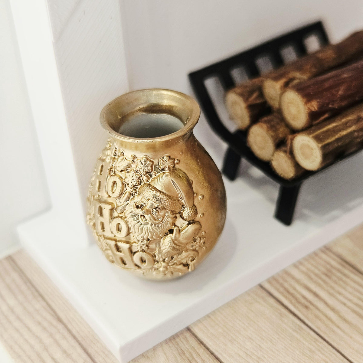 Gold santa ho ho ho vase in a 1:12 scale dolls house display, detail view 2