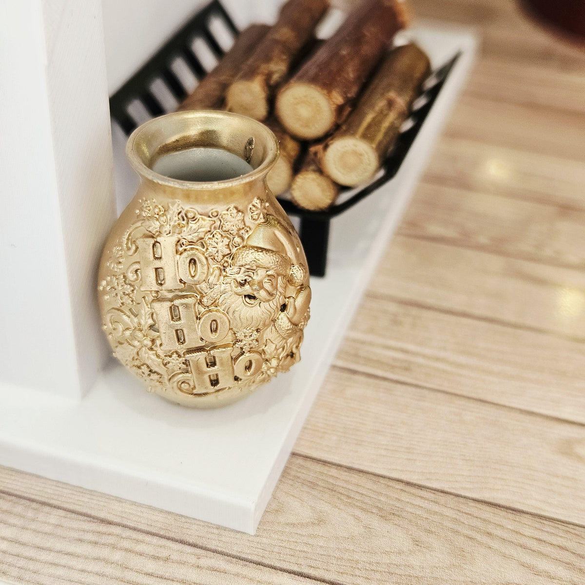 Gold santa ho ho ho vase in a 1:12 scale dolls house display, detail view 3